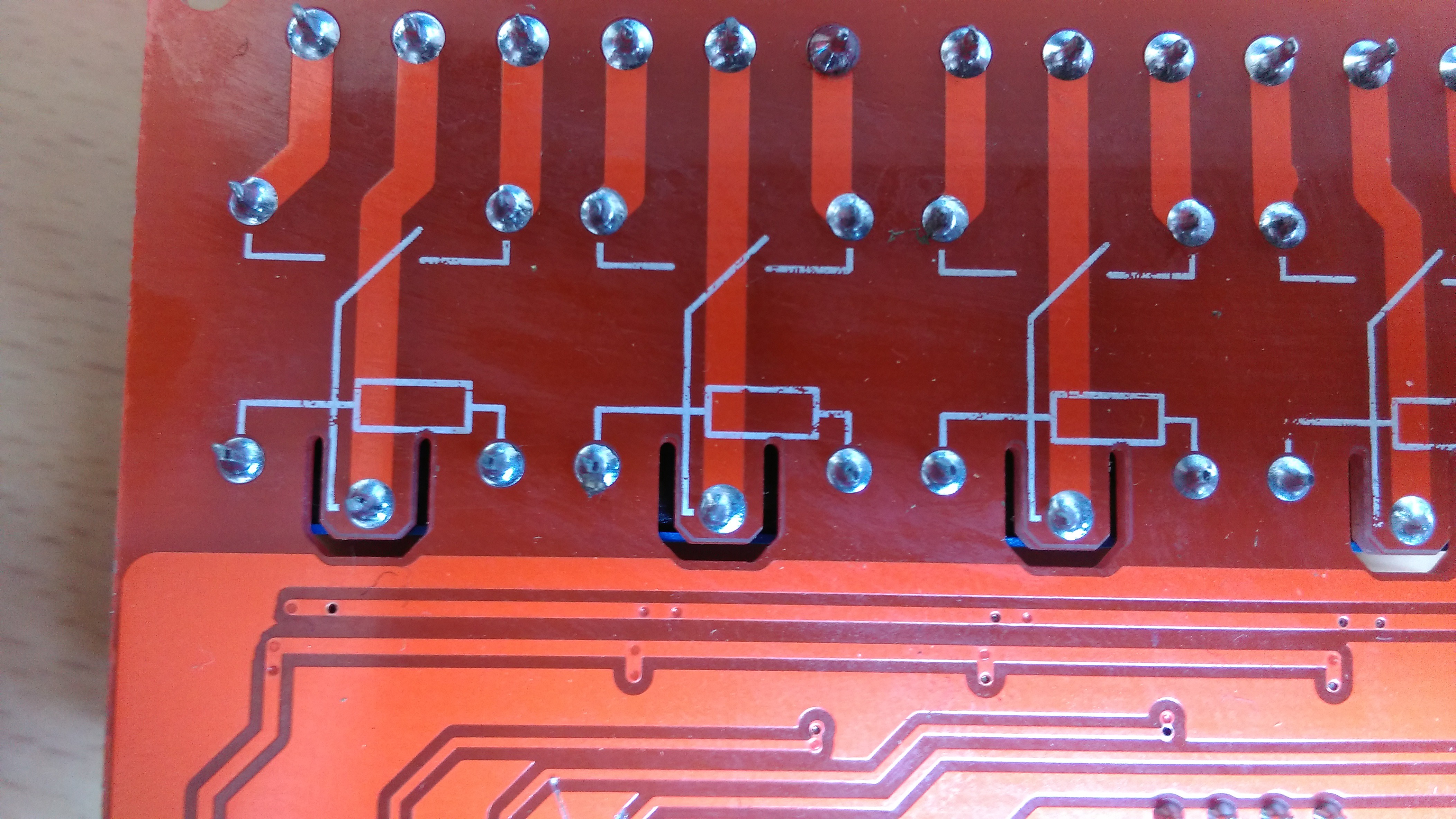 Zoomed rear of PCB showing relay isolation